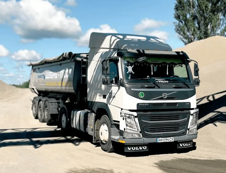 a truck with crushed stone